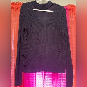 Stylish sweater! Cut out in neck area, and intentional shredding through out
